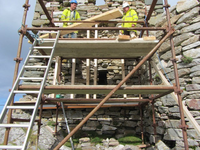 Builder John (Eddie) Doherty and David McLaughlin making safe the south wall before archaeological investigation.